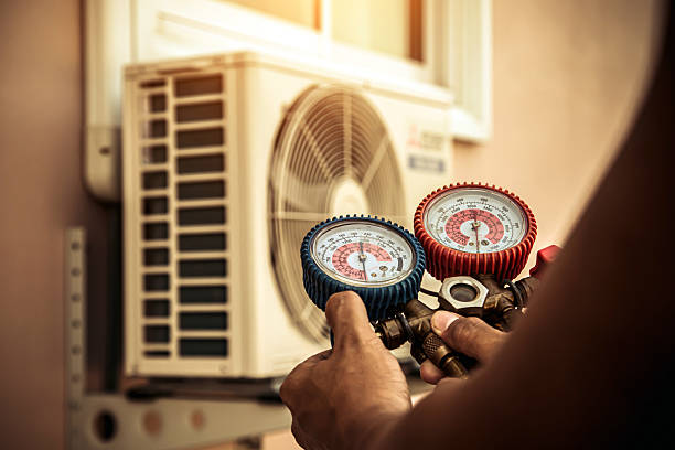 Professional Heat Pump Repair technician working in Barrington, NH